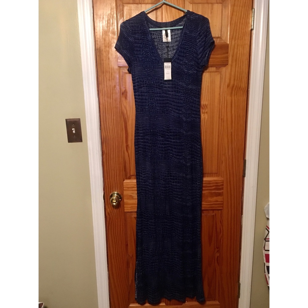 Brand new long Bcbg dress size L. Python print.